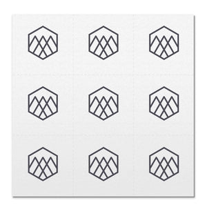 Front side page of Breathe (charcoal) mindful marks temporary mindfulness tattoo wearable reminders.
