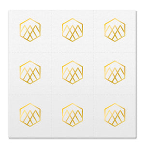 Front side page of Breathe (gold) mindful marks temporary mindfulness tattoo wearable reminders.