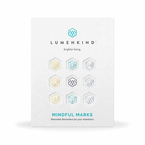 The front side of a pack of Mindful Marks —Balance Collection (Metallic), wearable reminders for your intentions.