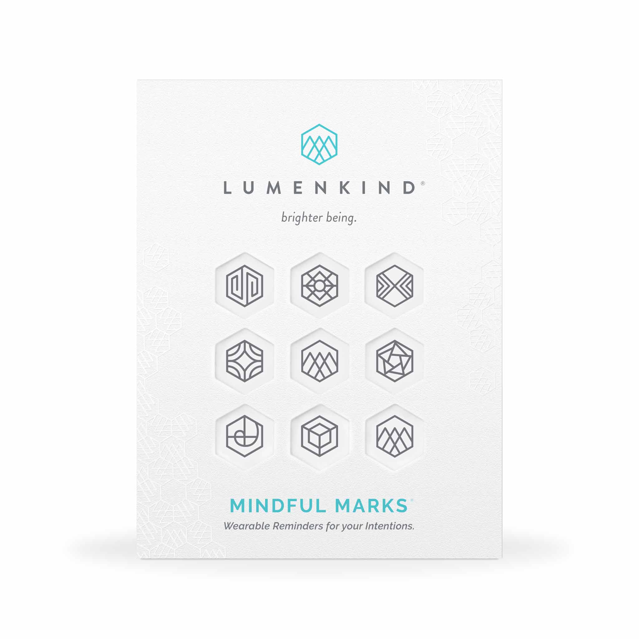 The front side of a pack of Mindful Marks —Balance Collection (Charcoal), wearable reminders for your intentions.