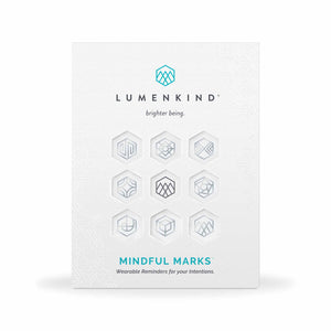 The front side of a pack of Mindful Marks —Balance Collection (platinum), wearable reminders for your intentions.