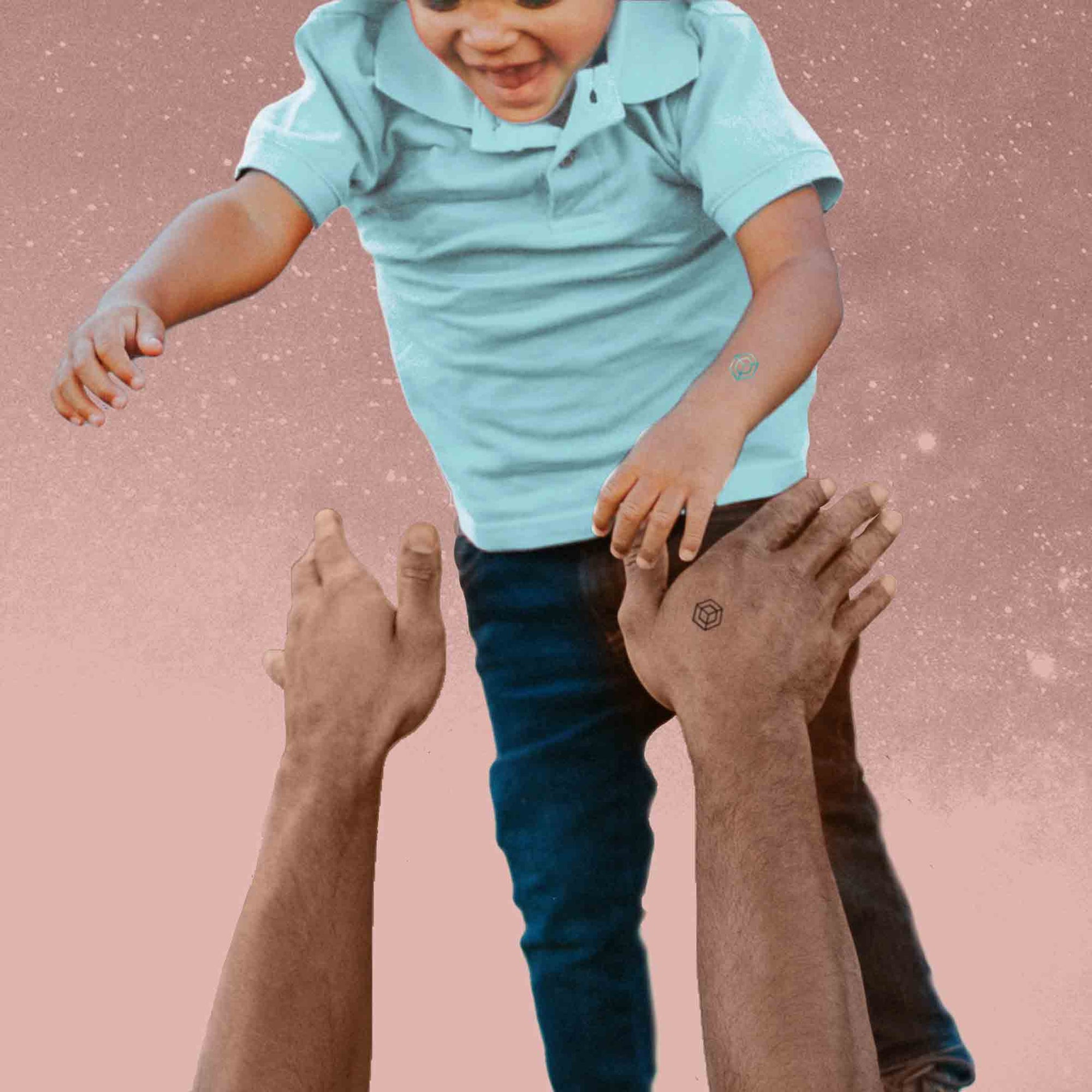 Dad and son are playing, both are wearing Mindful Marks.